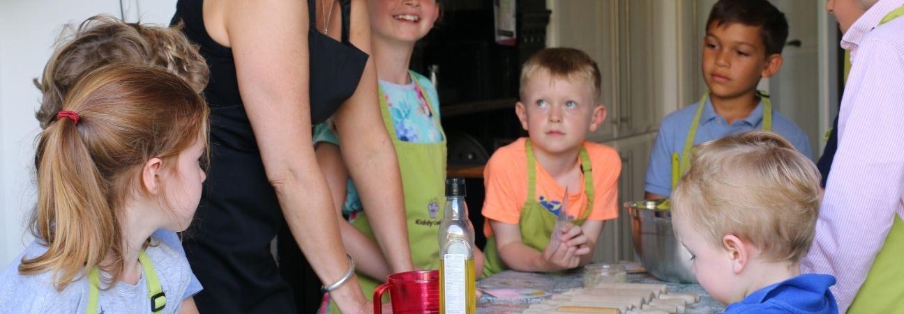 Children listening to adult